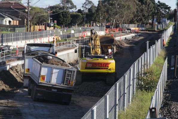 Removing dirt from the rail cutting at the down end of the new Ginifer station