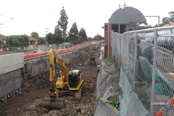 Rail cutting well underway behind the existing station at Ginifer