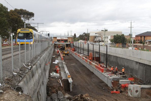 EDI Comeng passes work on the new low level station at Ginifer