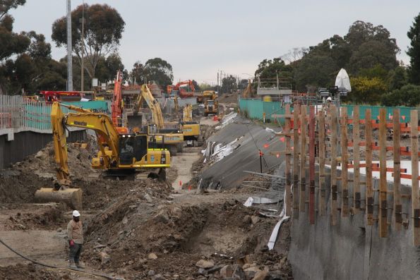 Looking north to excavators moving rock from the rail cutting north of St Albans station