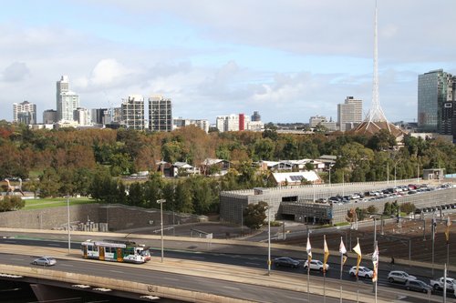 A class tram heads south on route 70 along the Exhibition Street Extension