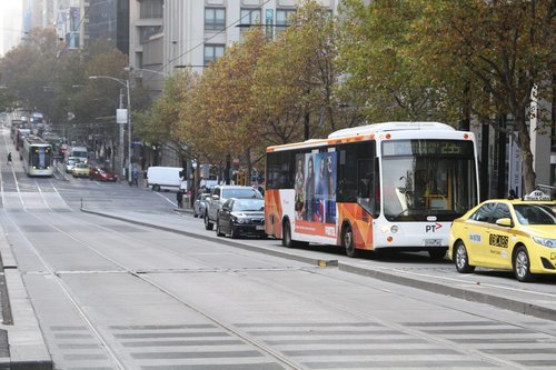 Transdev bus 0184AO on route 235 stuck in Collins Street traffic outside Southern Cross Station