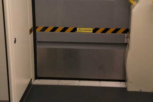 'No crew steps' notice on the wheelchair access door of VLocity 13xx cars in sets VL60 and above