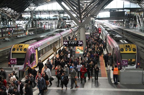 Passengers depart a VLocity train at Southern Cross platform 3