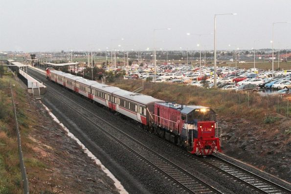 P14 leads P15 out of Tarneit station with a down push-pull service