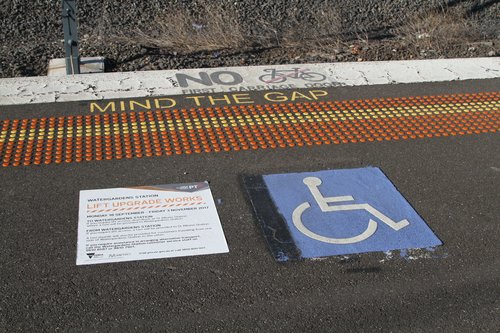 Notice on the platform informing passengers of lift upgrade works at Watergardens station