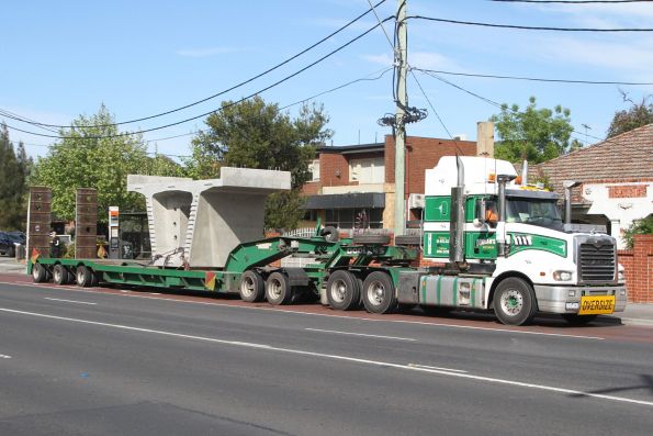 Concrete bridge segment waiting on Warrigal Road before delivery to the assembly site at Murrumbeena station