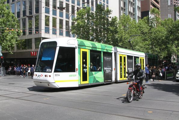 C.3034 heads east on route 109 at Collins and Swanston Street