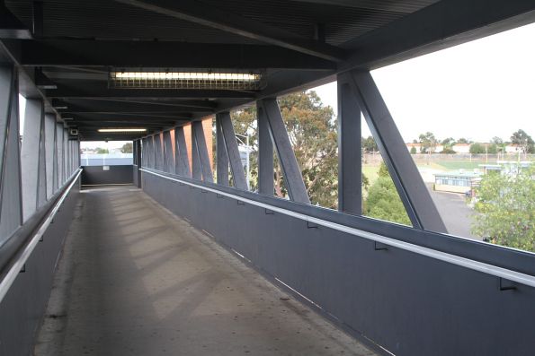 Footbridge across the tracks at Watergardens station