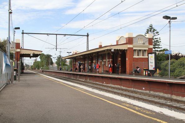 Passengers waiting for a citybound train at Spotswood station