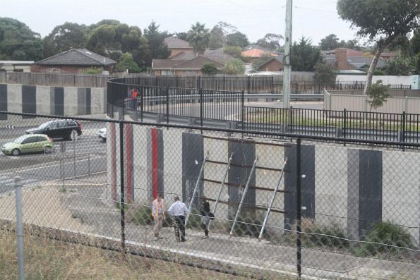 Staff inspect a failing retaining wall at the Taylors Road underpass at Keilor Plains