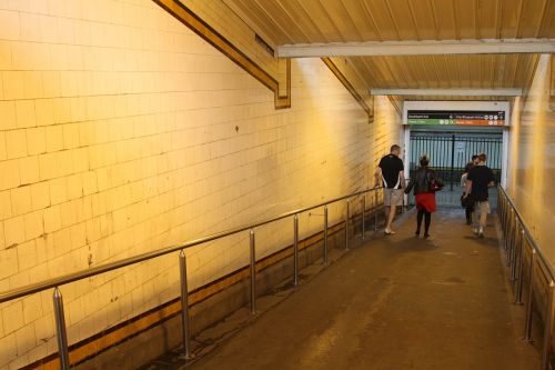 Advertising posters removed from the ramps down to the Elizabeth Street subway