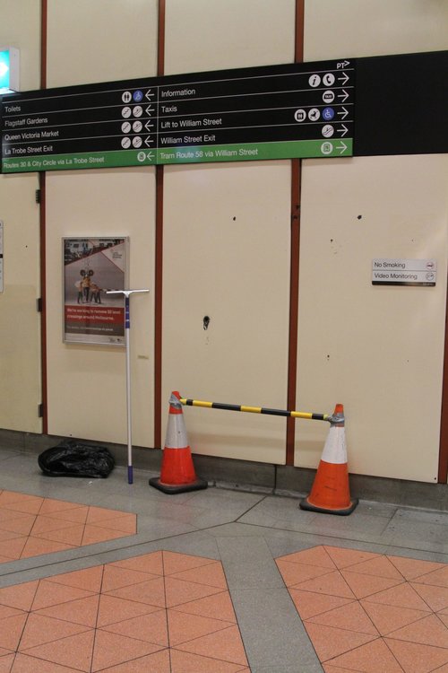 Witches hats at Flagstaff station mark where a JCDecaux digital billboard used to be 