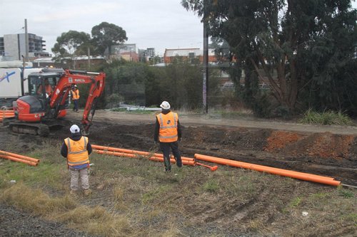 Installing new signal conduits at the down end of Oakleigh station