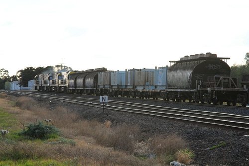 NGGF sugar wagons and 'butterbox' containers at the front of MW2 steel train at Albion