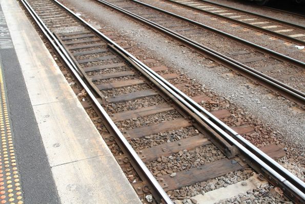 Static 'Common Rail Transfer' at the north end of dual gauge Southern Cross platform 2