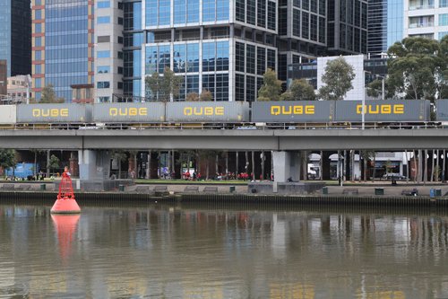 40 foot Qube containers in the consist of the up Maryvale freight on the Flinders Street Viaduct