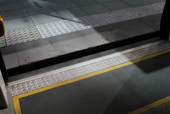 Big step out of an E class tram at the Collins and Spring Street stop