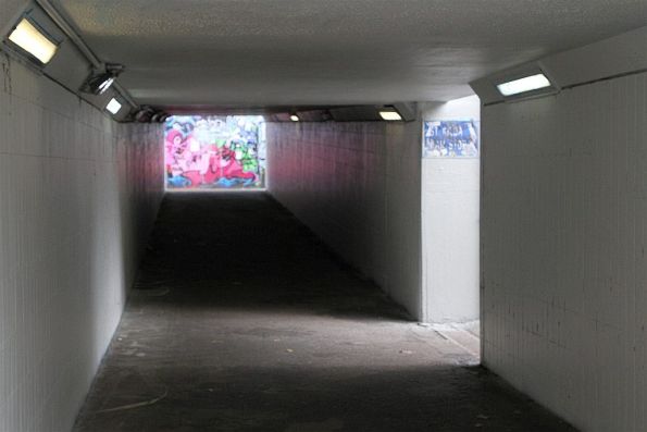 Dark and dingy tram stop underpass at St Kilda Junction