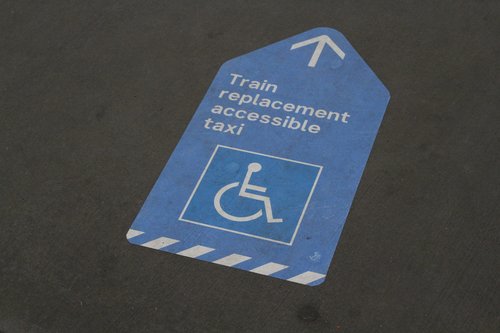 'Train replacement accessible taxi' sign at Sunshine station