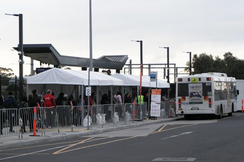 Passengers board Dysons bus #748 3183AO at Sunshine station