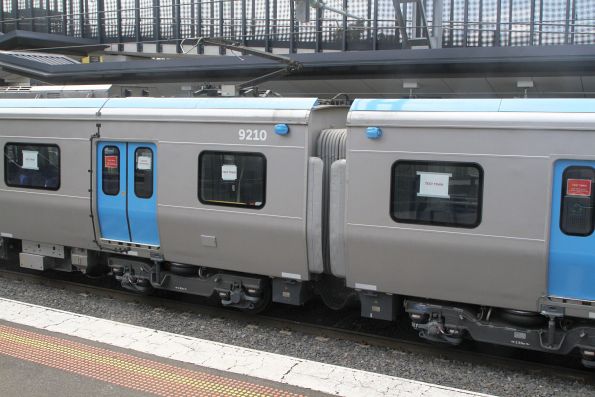 Rubber gap filling panels between the carriages