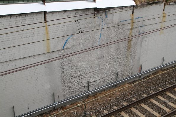 Shotcrete covers a failed section of brick retaining wall at Armadale