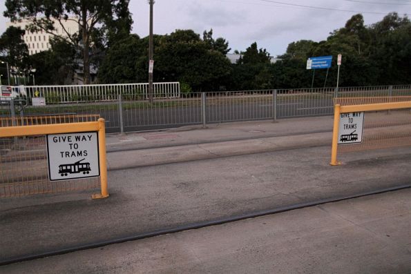 Pedestrian crossing links the citybound and outbound platforms at the Deakin University tram stop