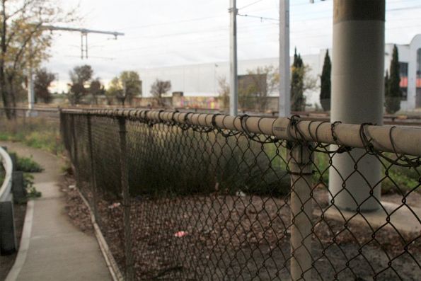 Barbed wire at neck height beside the footpath under Ballarat Road at Albion station