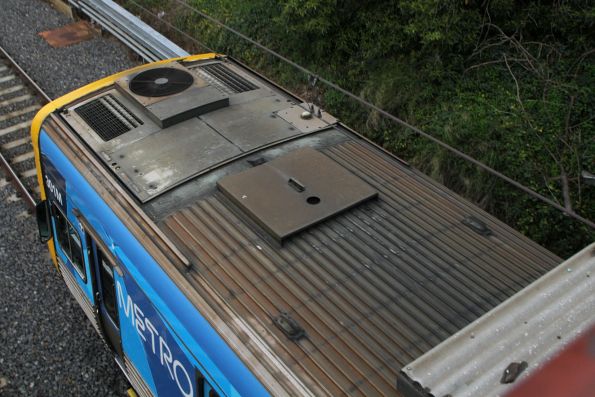 Different style ground plane antenna on the roof of Comeng 301M