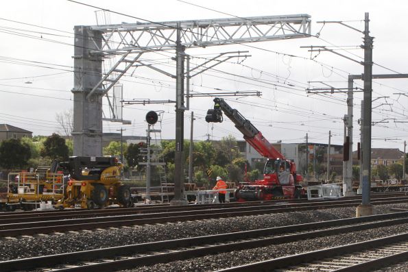 Erecting a new cantilevered signal gantry at the down end of West Footscray