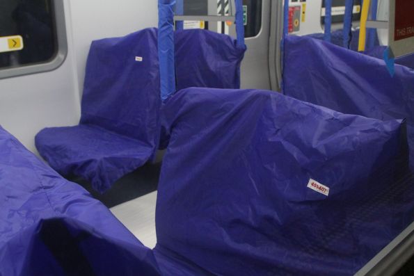 Dustcovers protect the seats of HCMT set 18 during HCS testing on the Mernda line