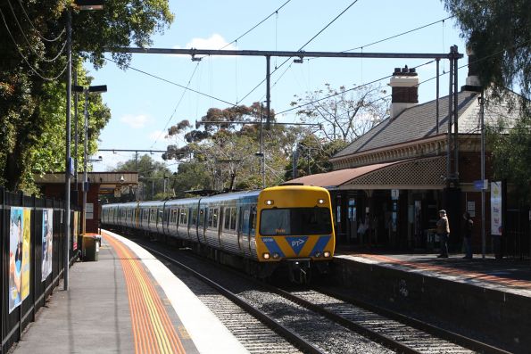 Alstom Comeng 561M on the up at Moonee Ponds