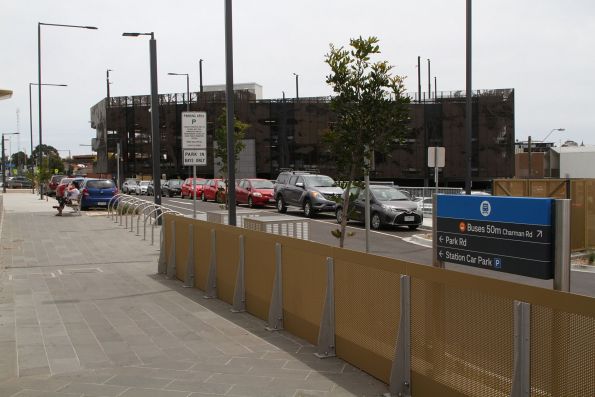 Multi storey car park towers over the station at Cheltenham