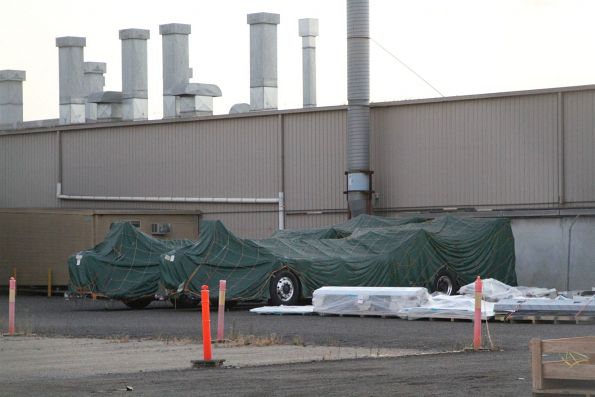 Pair of BYD electric bus chassis parked outside the Volgren Dandenong factory