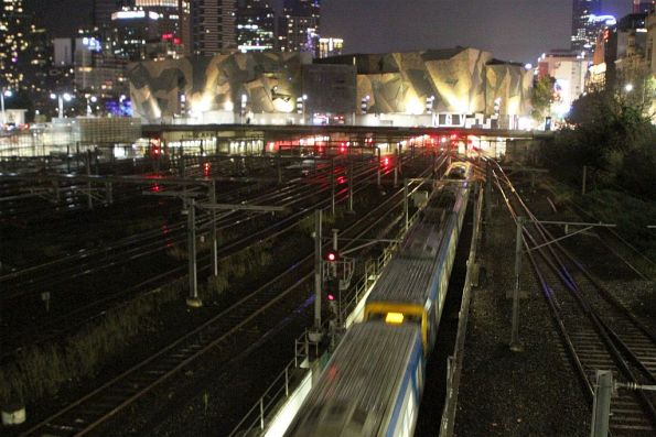 X'Trapolis train emerges from the City Circle Loop portal bound for Flinders Street