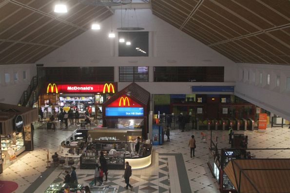 Looking down on Box Hill Central shopping centre and station concourse from the bus deck