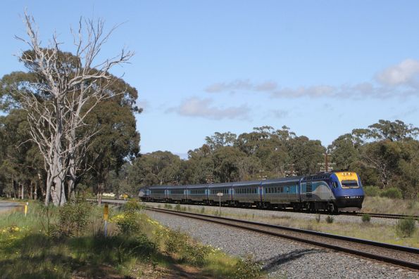 Northbound XPT led by XP2008 and XP2015 passes the former junction at Mangalore