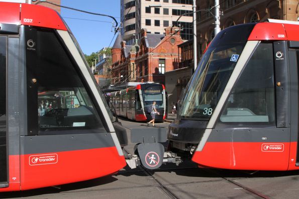 Coupled Citadis trams #37 and #38 on a L3 Circular Quay service pass classmate #02 on L1 to Dulwich Hill at Hay and George Street