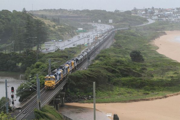 8142, 8139, 8210 and 8245 pass through Bombo on a down grain train bound for the Manildra plant at Bomaderry