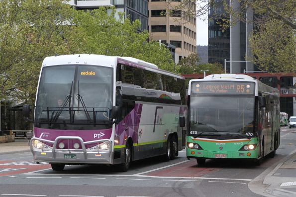 PTV liveried Dysons coach #971 BS02JO on a Bairnsdale service passes ACTION bus #470 on route R5 at City Interchange, Canberra