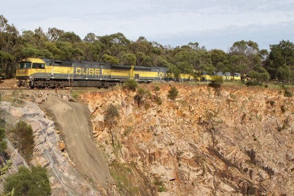 QL008 leads QL001 and QL004 lead a northbound steel train on the upper level of the Bethungra Spiral