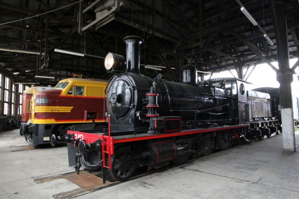 Steam locomotive 2413 on display in the roundhouse