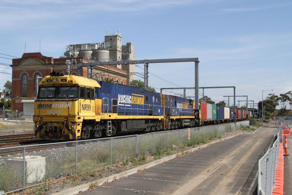 NR99 leads NR36 through Albion on 6SM2 southbound intermodal