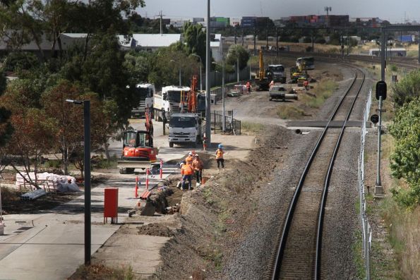 Installing new signalling and power conduit beside the standard gauge line at Sunshine