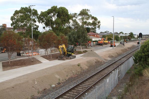 Installing new signalling and power conduit beside the standard gauge line at Sunshine station