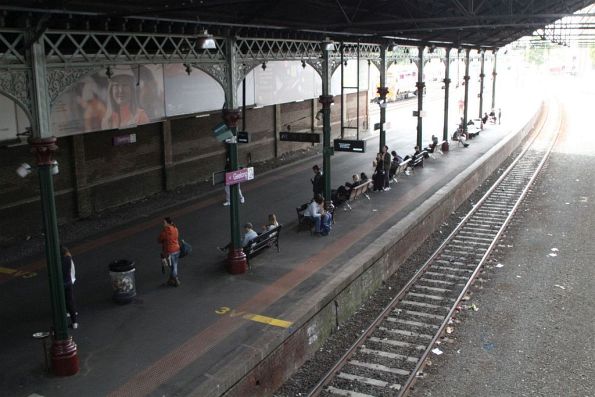 Passengers waiting at Geelong platform 3 to board the next service towards Melbourne