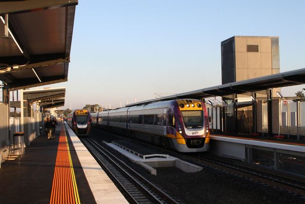 VLocity VL24 passes VL41 at the new elevated Deer Park station