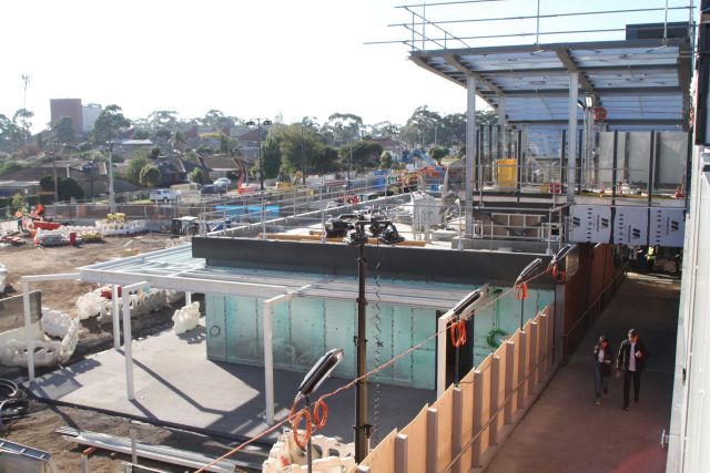 Incomplete station building, stairs and lift to platform 1 