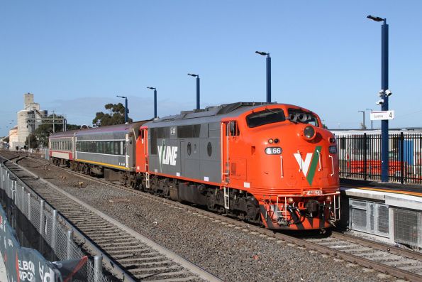 A66 leads retired V/Line passenger cars BTN 263 and BTN 268 through Sunshine on a transfer to Castlemaine